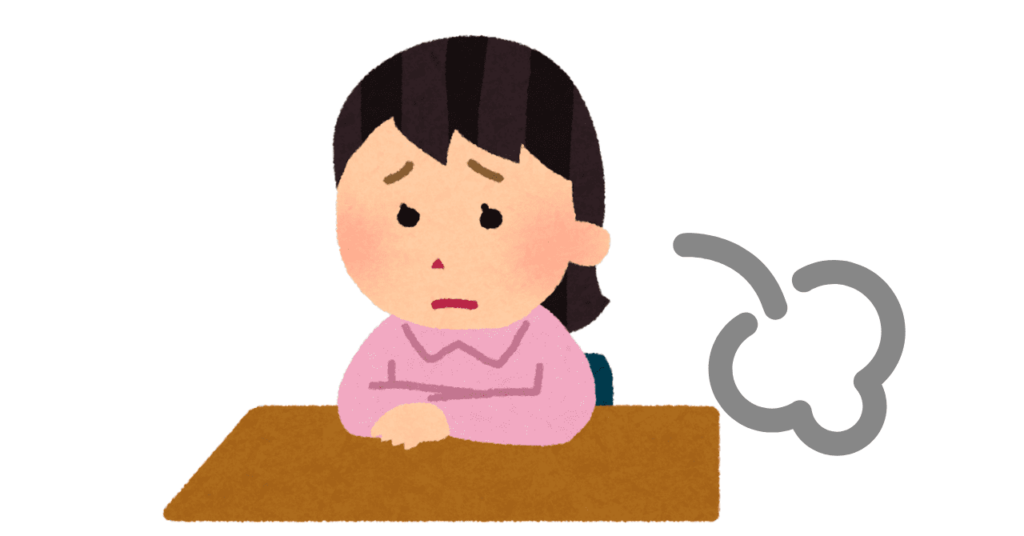 ため息をつく女性