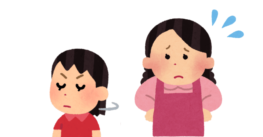 怒った表情で知らん顔する少女と、困った表情の母