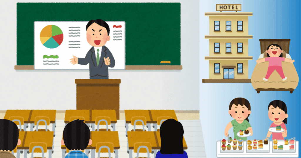 教室内で授業をする先生と、座って授業を受ける生徒