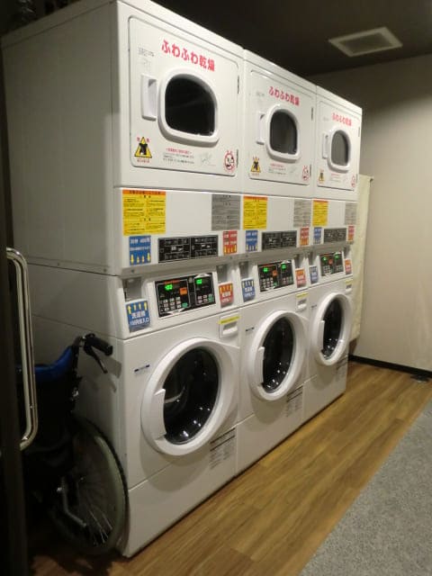 ハナホテル伊香保 ホテル内のコインランドリー機の写真